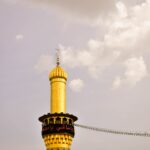 yellow and black concrete minaret tower