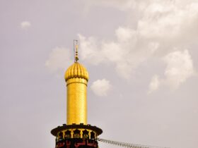 yellow and black concrete minaret tower