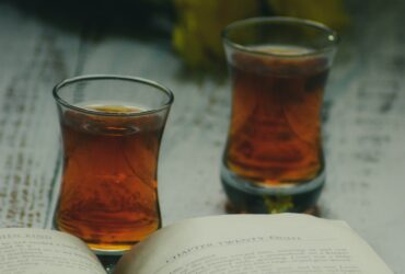 clear shot glass on book page