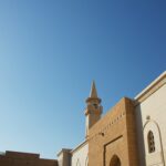 brown concrete building under blue sky during daytime