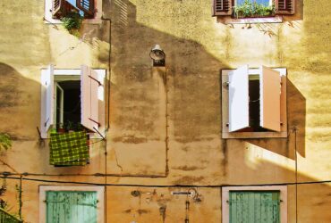 white and black outdoor ac unit