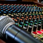 black and silver microphone on audio mixer