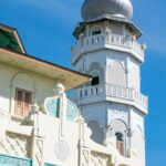 white concrete building under blue sky during daytime