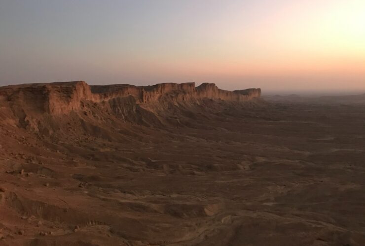 brown rocky mountain under gray sky during daytime