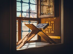 black and white table lamp on brown wooden table