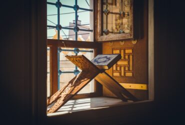 black and white table lamp on brown wooden table