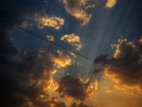 white clouds under blue sky during golden hour