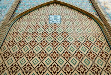 blue white and brown floral textile