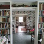 assorted-title book lot on bookshelves