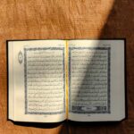 white printer paper on brown wooden table