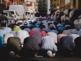 people kneeling and praying during daytime