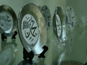 silver and gold round ornament