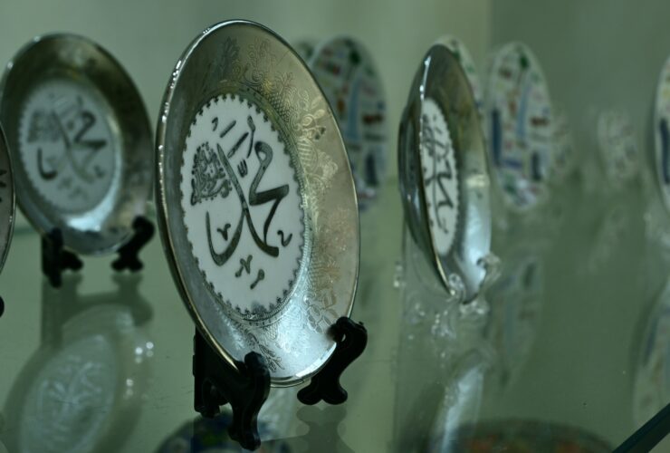 silver and gold round ornament