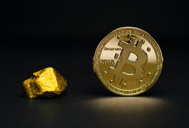 round gold-colored bit coin