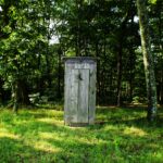 gray wooden outdoor portable bathroom