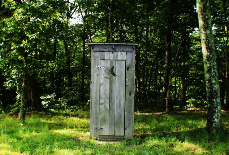 gray wooden outdoor portable bathroom