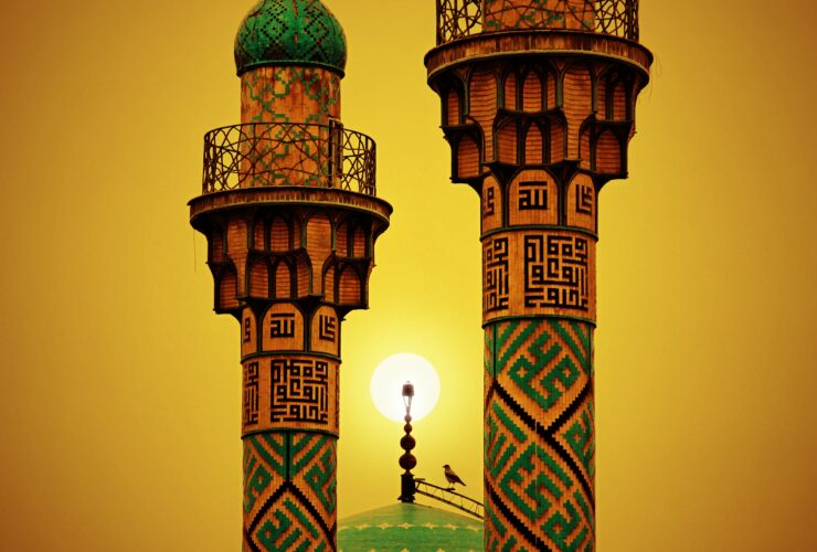 brown and green tower with light