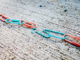 blue green and red plastic clothes pin