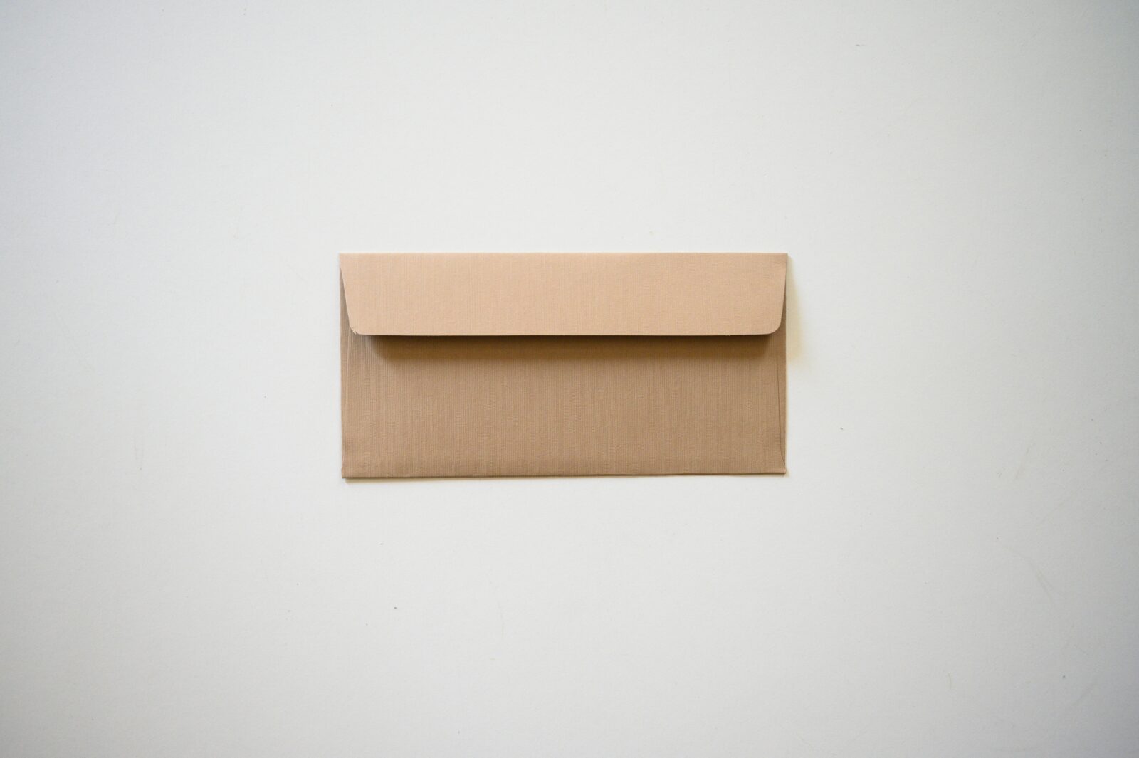 brown cardboard box on white table