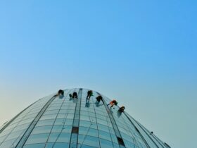 people hanging on building