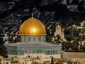 in distant photo of gold and blue temple