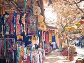 assorted clothes hanged on clothes line during daytime