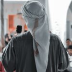 person in white hijab and black long sleeve shirt