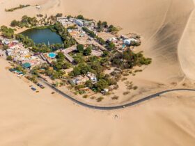 aerial photography of town in the middle of the desert