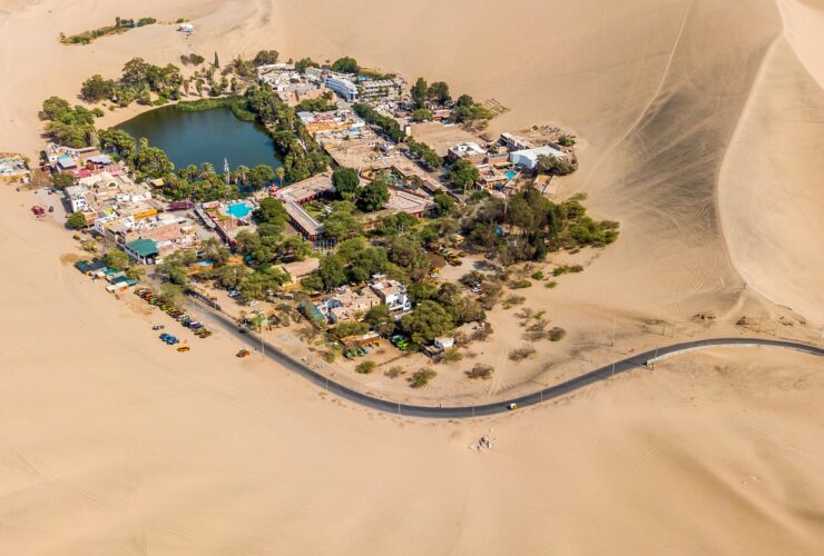 aerial photography of town in the middle of the desert