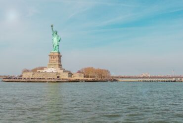 Statue Of Liberty on island surrounded by water