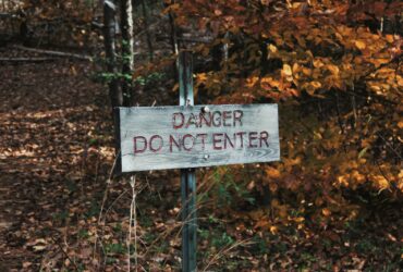 photo of gray danger do not enter signage