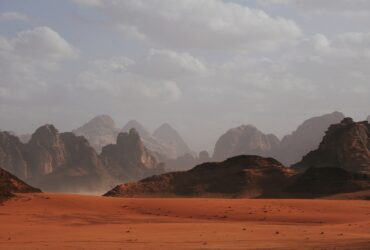 mountains under white clouds at daytime