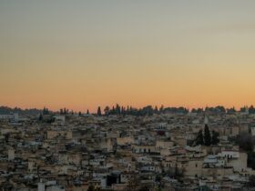 concrete buildings under clouds