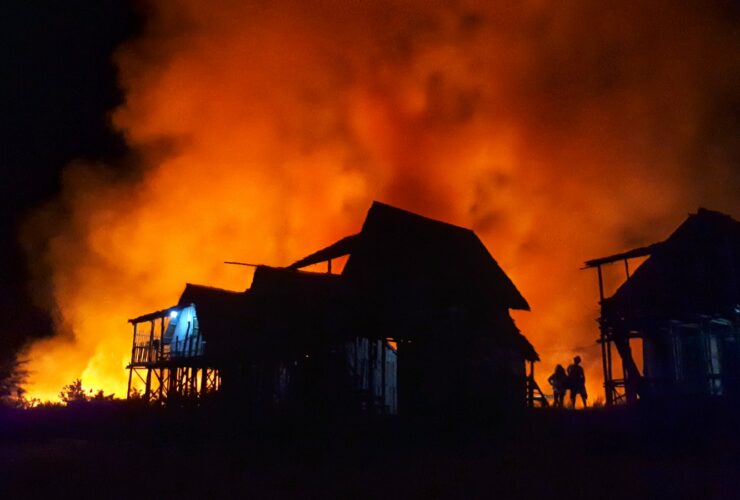 silhouette of houses during nighttime