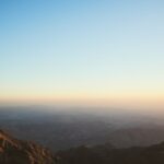 brown mountains under blue sky during daytime