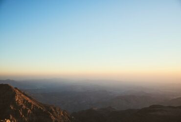 brown mountains under blue sky during daytime