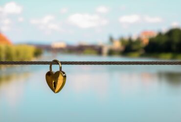 heart brass-colored padlock