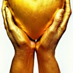 persons hand on white surface