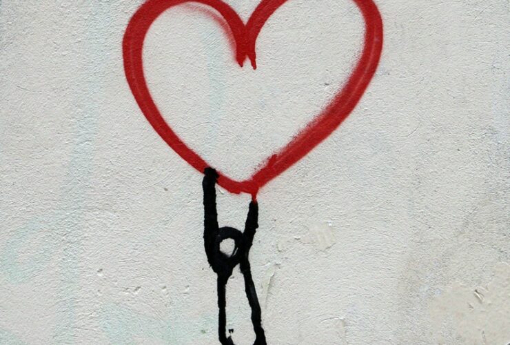 red heart and man hanging drawing