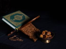 blue book beside brown wooden stick