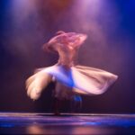woman in white long sleeve shirt with white scarf