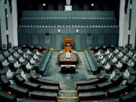 tables and chairs inside the hall