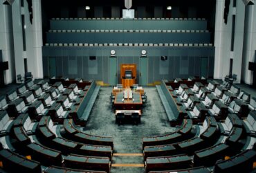 tables and chairs inside the hall