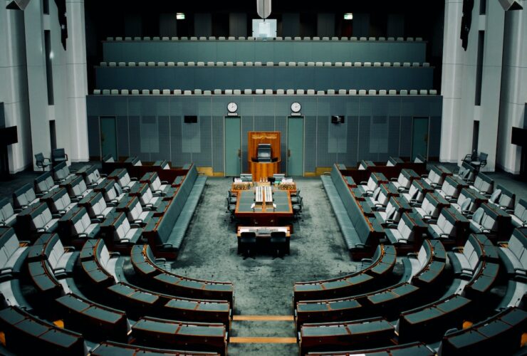 tables and chairs inside the hall