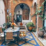 brown wooden table with chairs