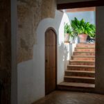 white building showing closed door
