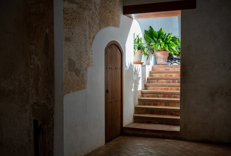 white building showing closed door