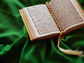 white book page on green textile