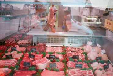 raw meat in clear plastic container