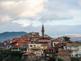 a city with a clock tower on top of it